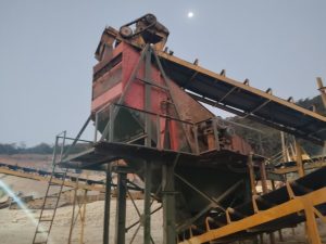 Old aggregate screening system at Guinea granite quarry before upgrade